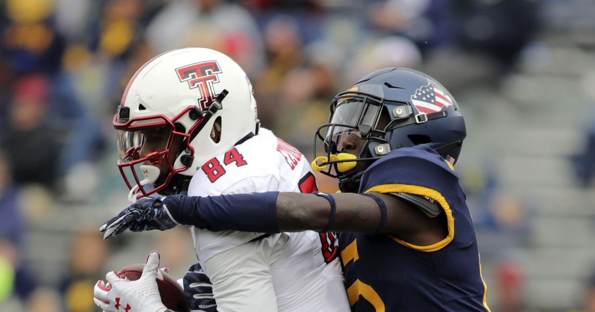 West Virginia DC Koenning on leave after player accusations