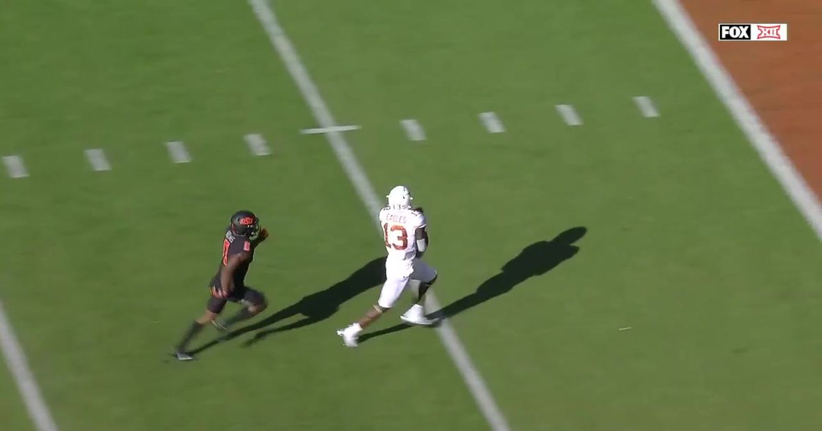 Texas’ Brennan Eagles takes Sam Ehlinger pass 41 yards for a TD to tie it up vs. No. 6 Oklahoma St., 14-14
