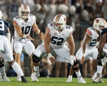 Auburn vet center Brahms retiring from football