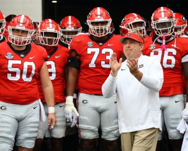 No. 1 Dawgs dedicate win to late coach Dooley