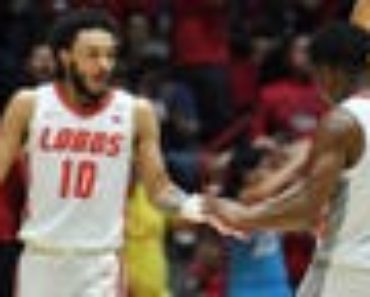 New Mexico’s Jamal Mashburn carries the Lobos to a tight victory over Wyoming