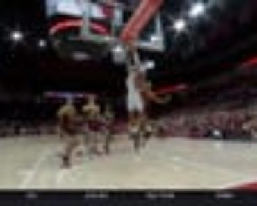 Ohio State’s Tanner Holden slashes to the rim and throws down a wild jam to trim Minnesota’s first-half lead