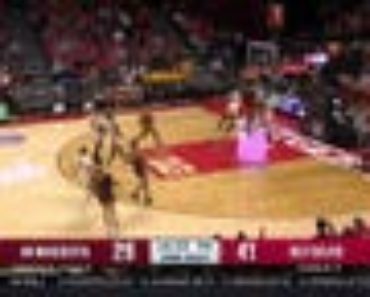 Minnesota’s Joshua Ola-Joseph goes up strong and throws down a powerful two-handed dunk against Rutgers