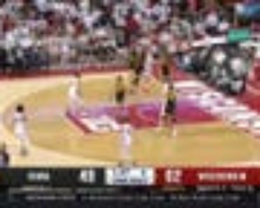 Wisconsin’s Connor Essegian finishes a CRAFTY layup to seal 64-52 victory over Iowa